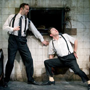 Isaacs and Evans distrust the mysterious serving hatch (photo: Johan Persson)